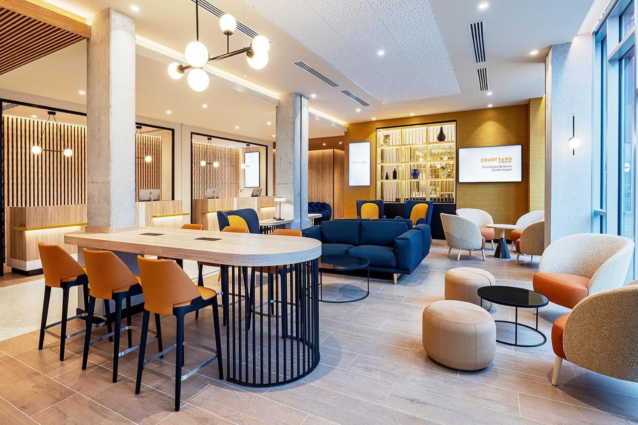 Courtyard By Marriott Paris Charles De Gaulle Central Airport Руасси-эн-Франс Экстерьер фото