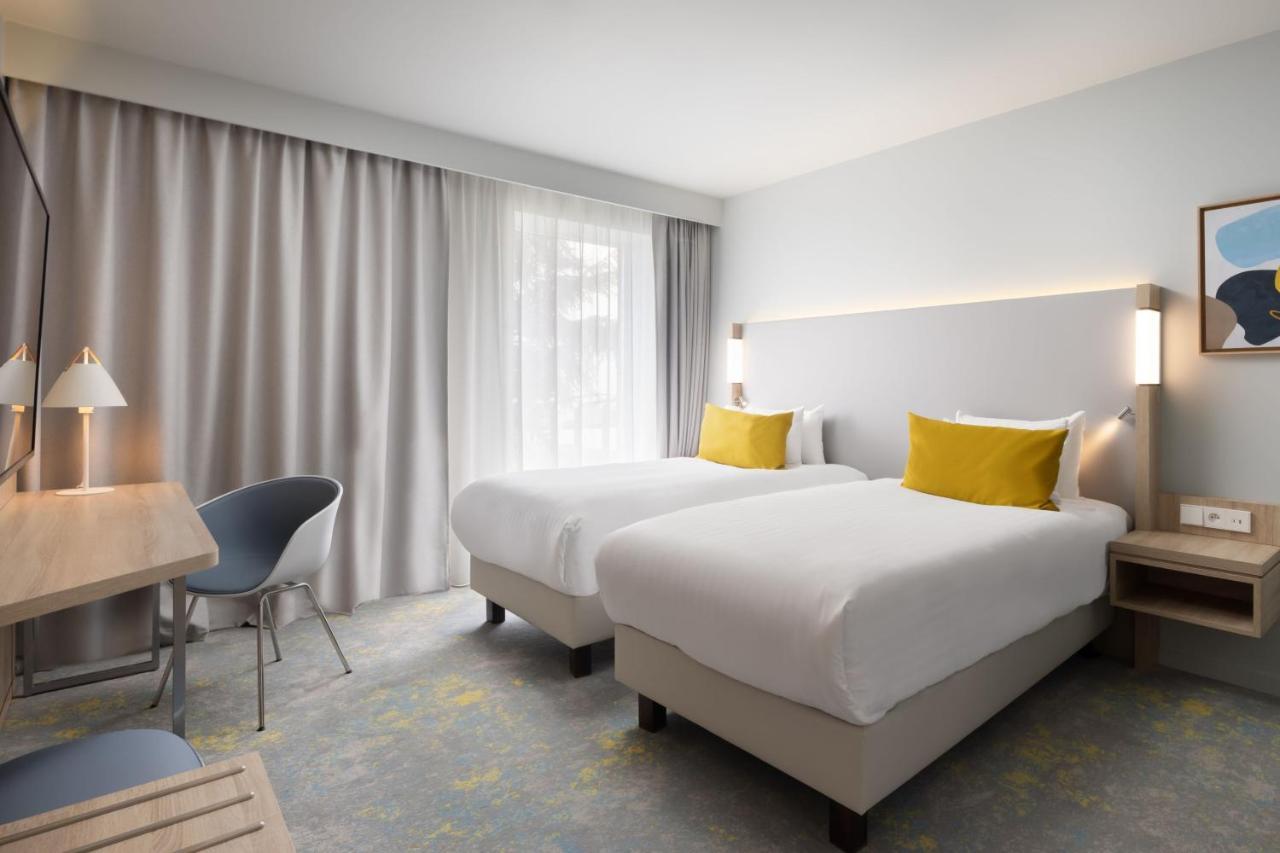 Courtyard By Marriott Paris Charles De Gaulle Central Airport Руасси-эн-Франс Экстерьер фото