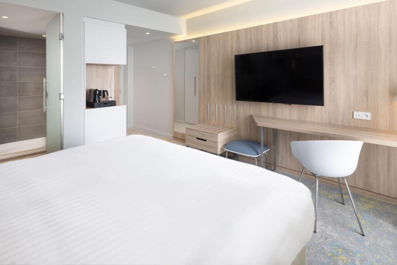Courtyard By Marriott Paris Charles De Gaulle Central Airport Руасси-эн-Франс Экстерьер фото