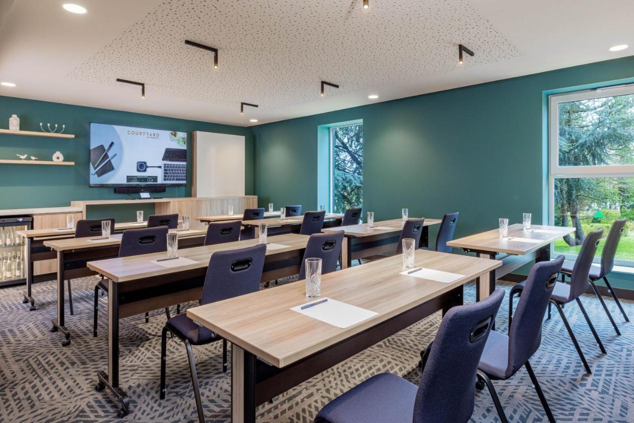 Courtyard By Marriott Paris Charles De Gaulle Central Airport Руасси-эн-Франс Экстерьер фото