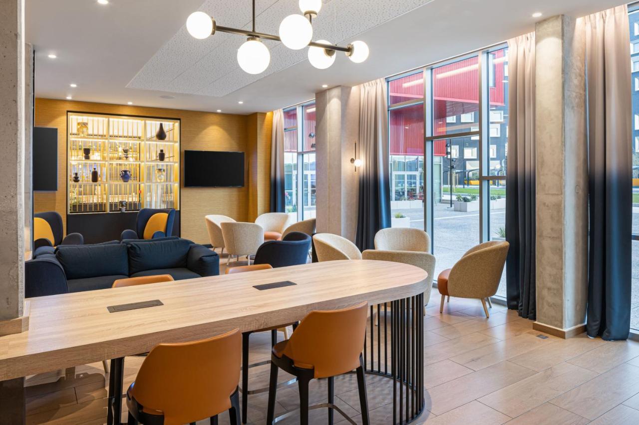 Courtyard By Marriott Paris Charles De Gaulle Central Airport Руасси-эн-Франс Экстерьер фото